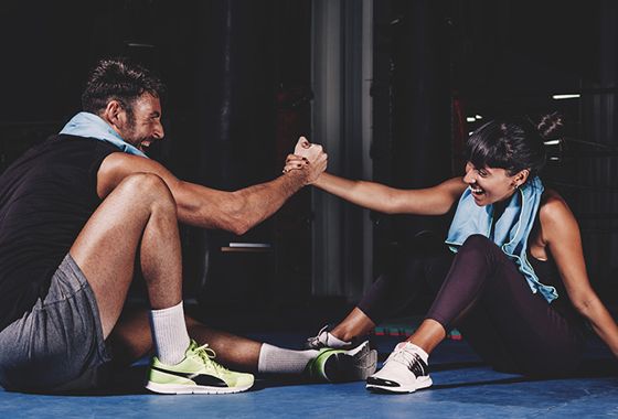 Personal trainer coaching a client
